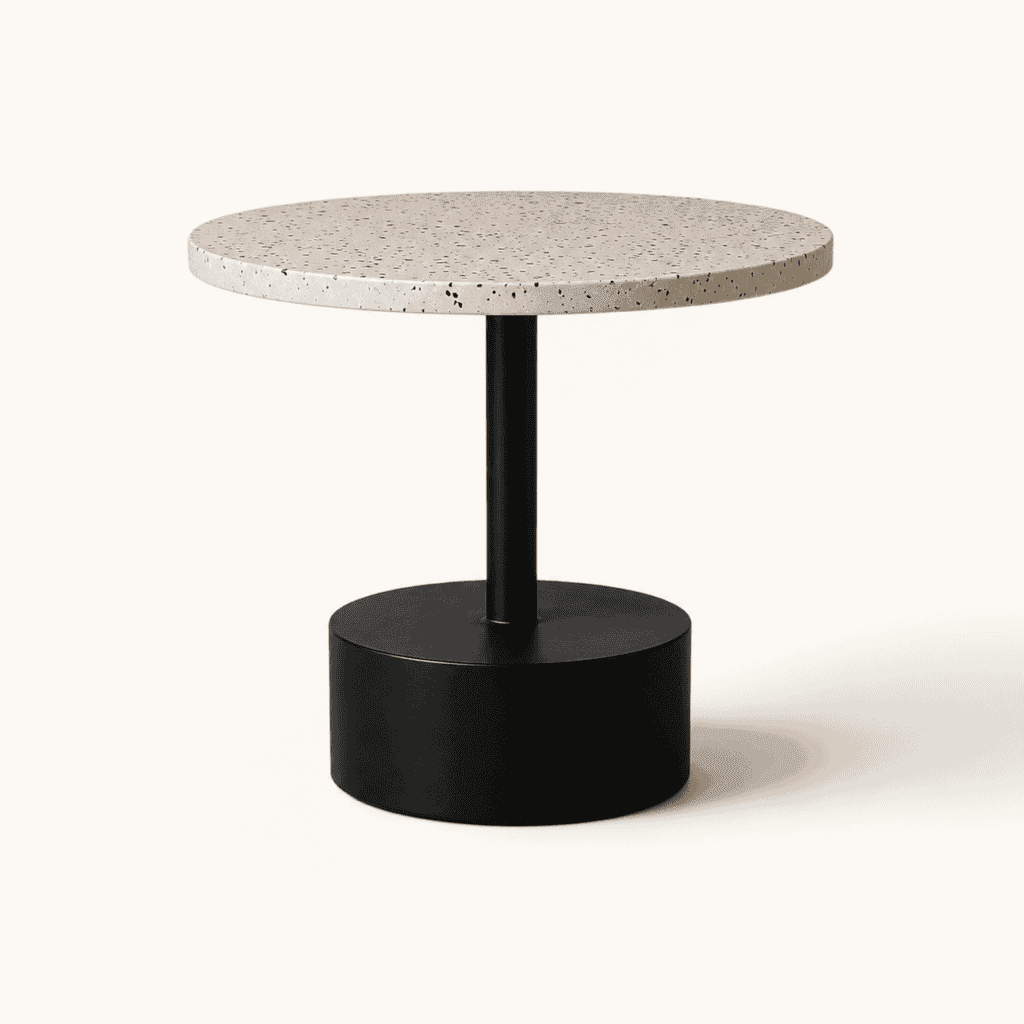 White terrazzo side table with black base available to hire from Juno Hire London